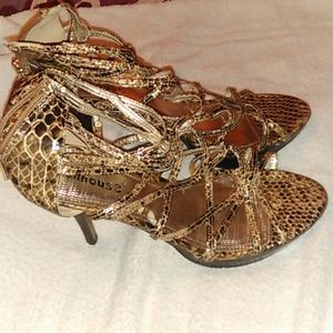 Dollhouse snake skin high heels gently used